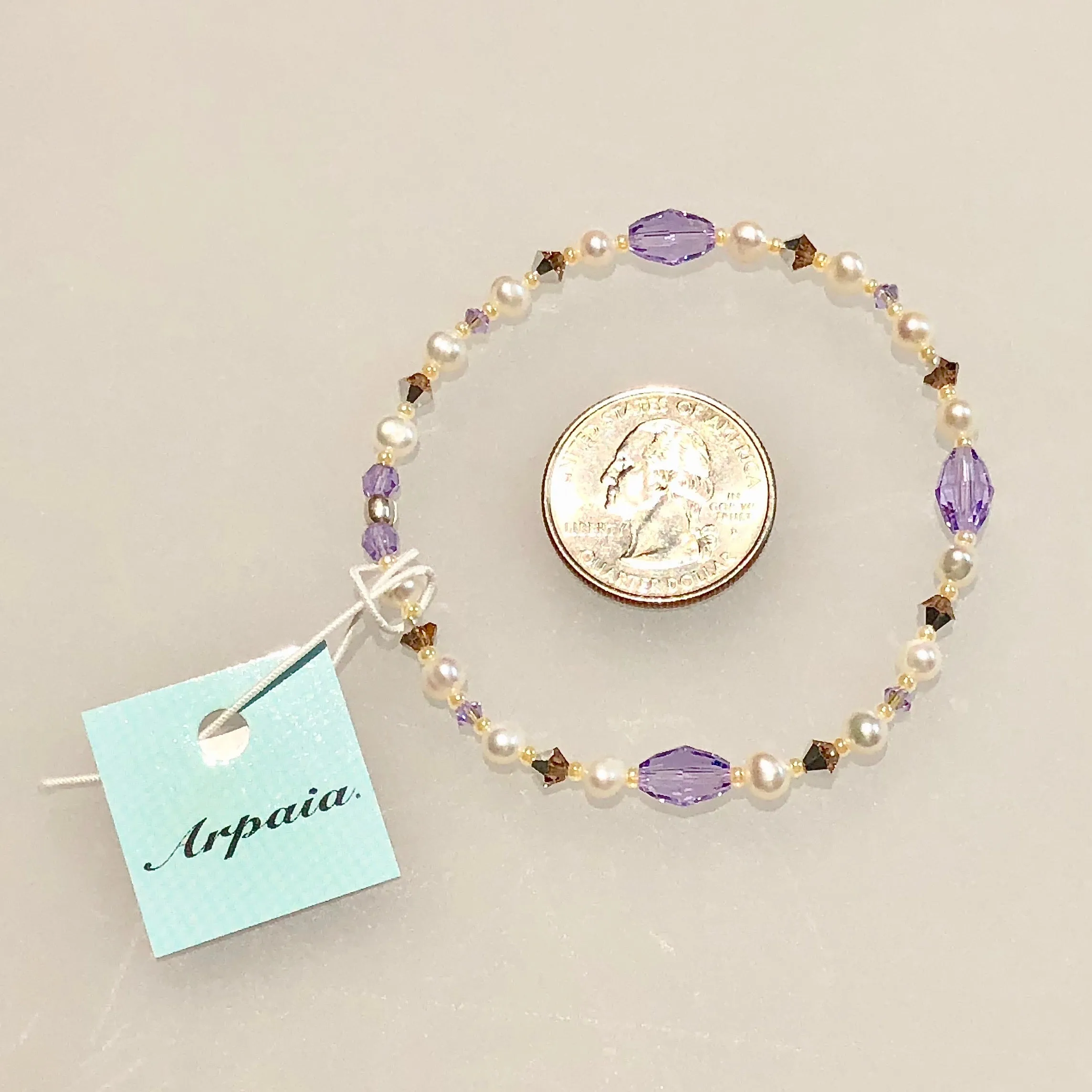Arpaia 7.5" stretch bracelet with white cultured pearls, glass seed beads, and Swarovski crystal