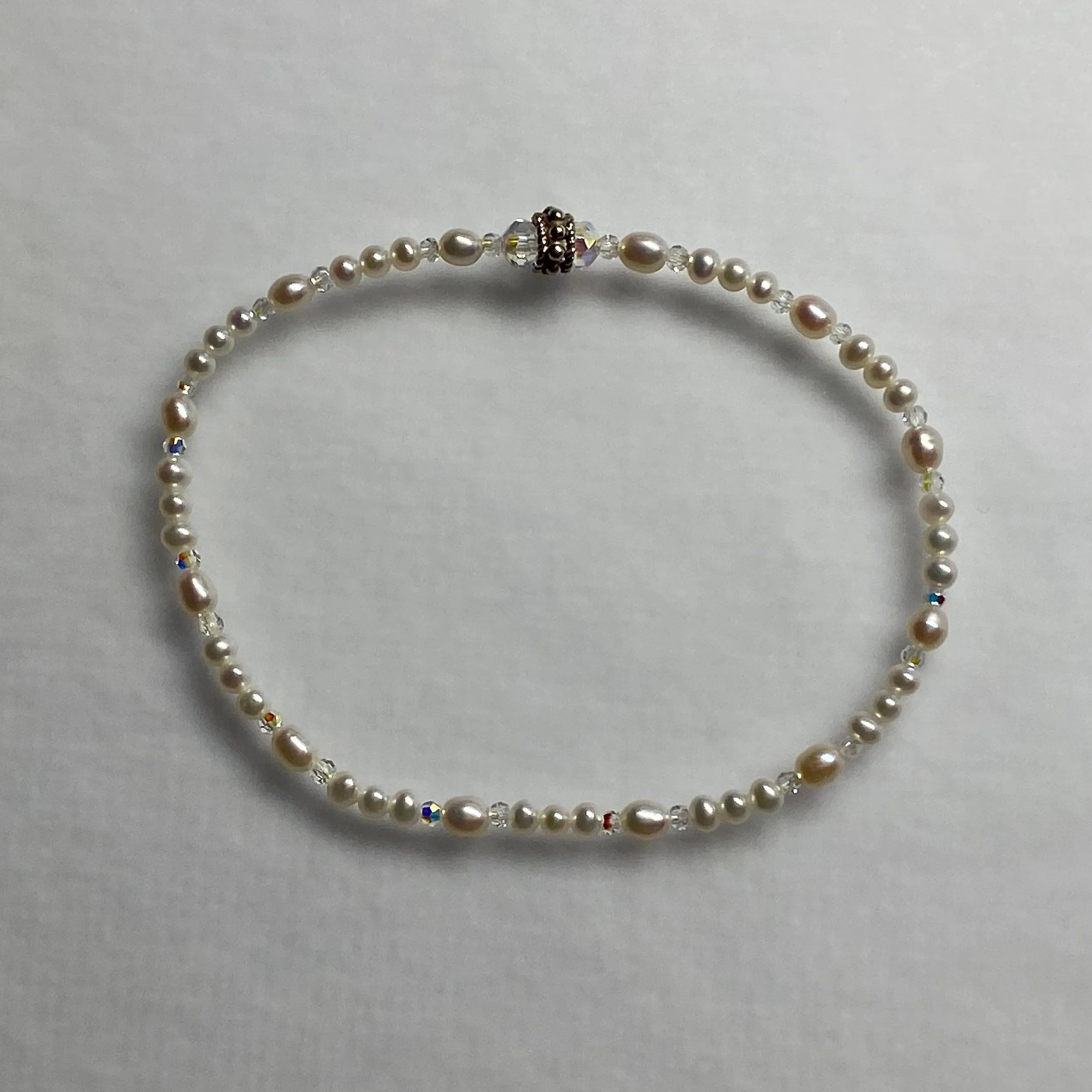 Arpaia 7" stretch bracelet with white baby freshwater cultured pearls and Swarovski crystal beads