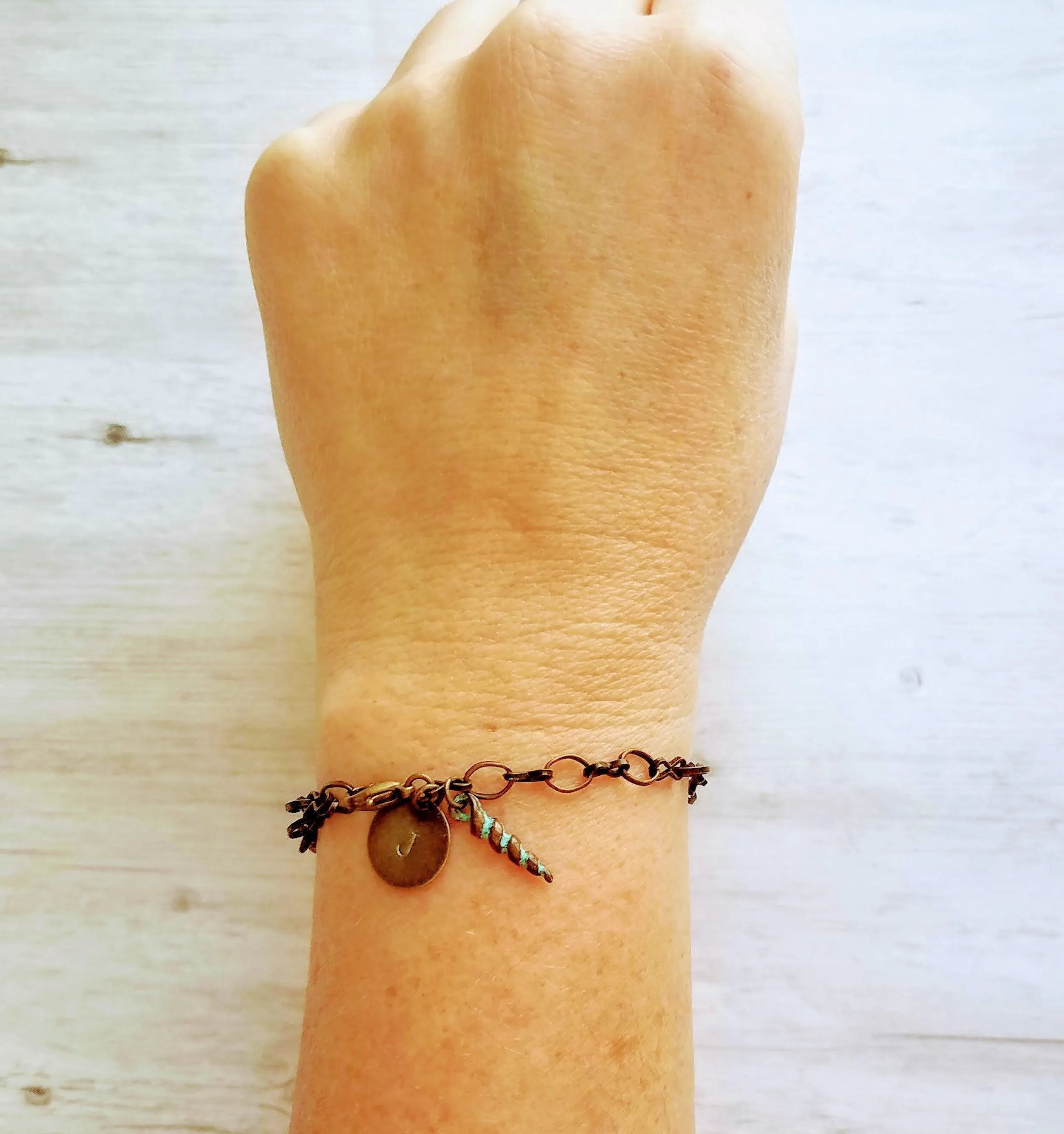 Beach Bracelet, antique brass bracelet, bronze bracelet, seashell bracelet, initial bracelet, shell charm bracelet, letter bracelet, spiral