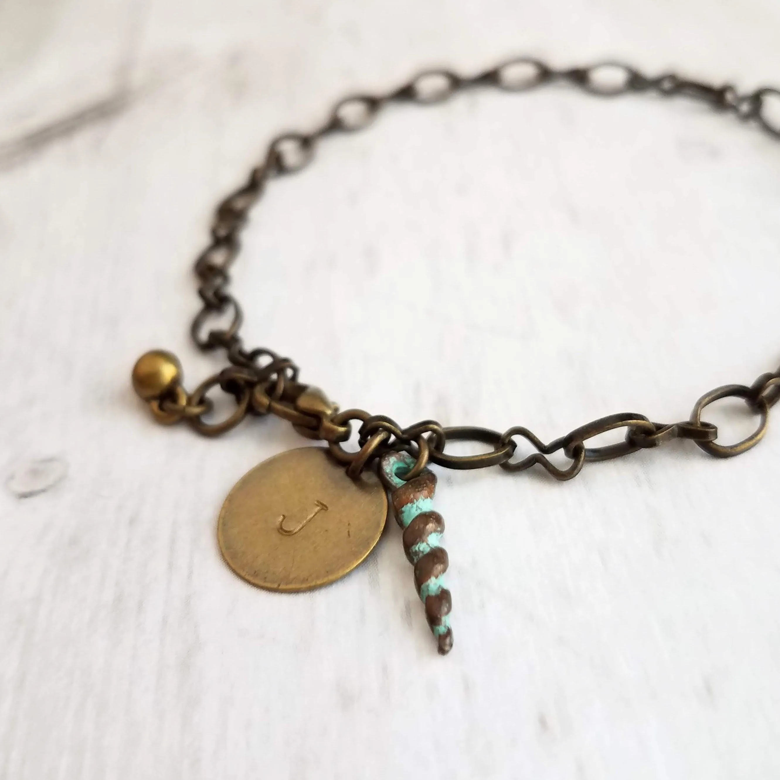 Beach Bracelet, antique brass bracelet, bronze bracelet, seashell bracelet, initial bracelet, shell charm bracelet, letter bracelet, spiral