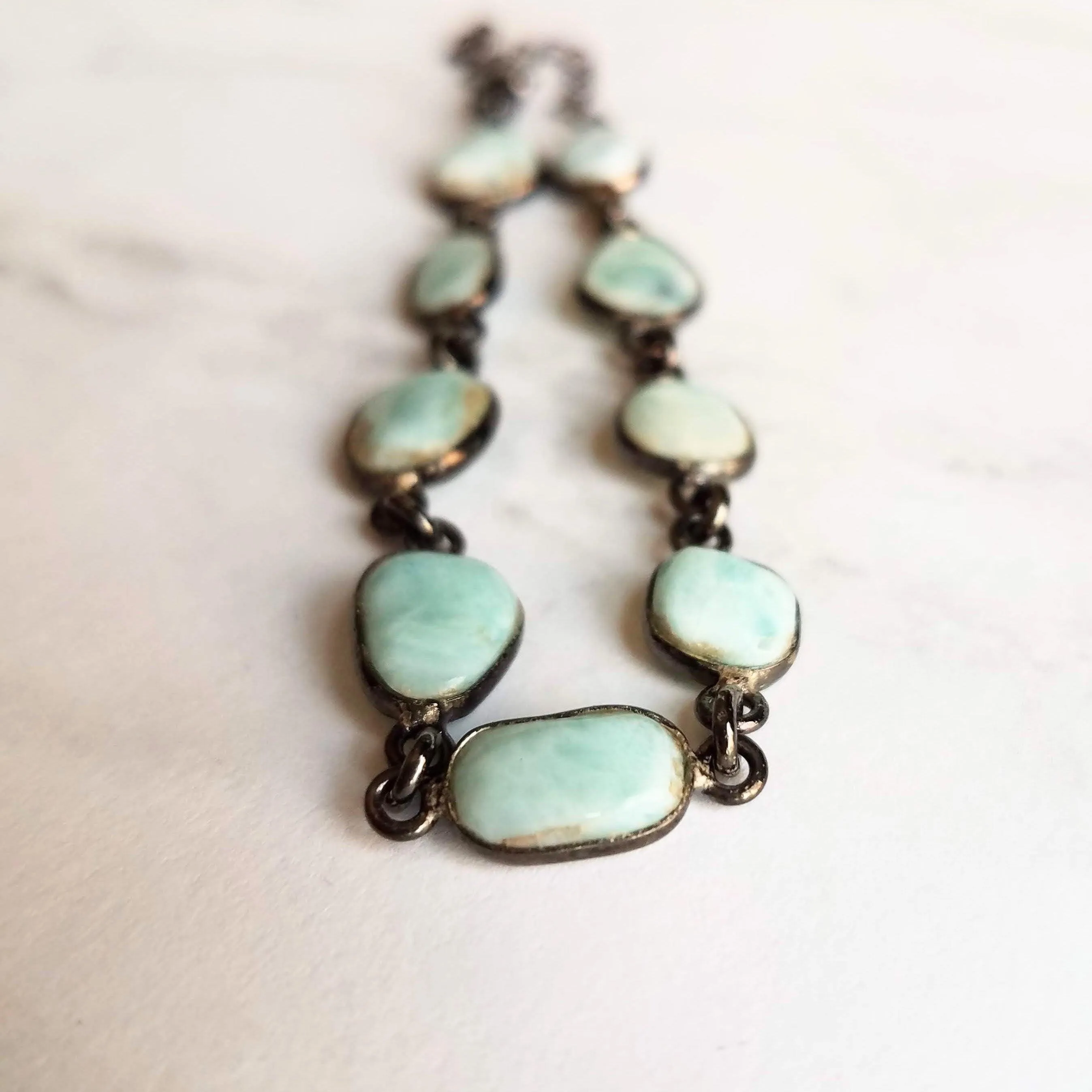 Blue Larimar Bracelet - shiny black gunmetal bezel frames, small organically shaped oval gemstones, aqua genuine stone adjustable chain