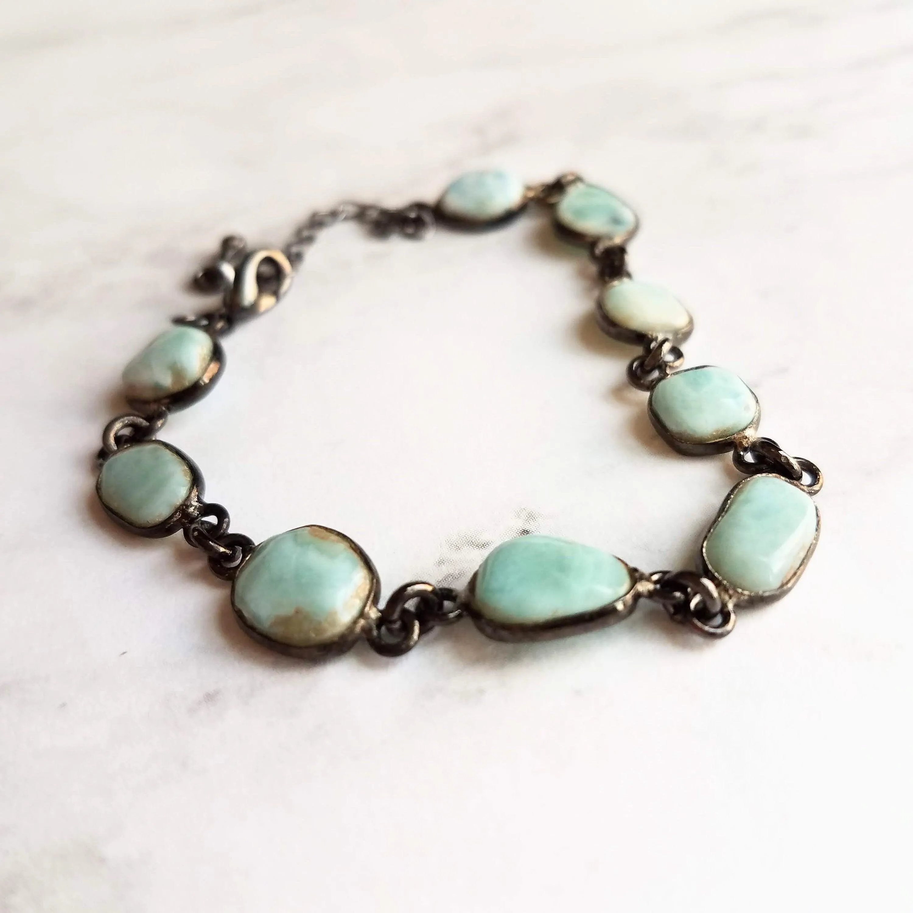 Blue Larimar Bracelet - shiny black gunmetal bezel frames, small organically shaped oval gemstones, aqua genuine stone adjustable chain