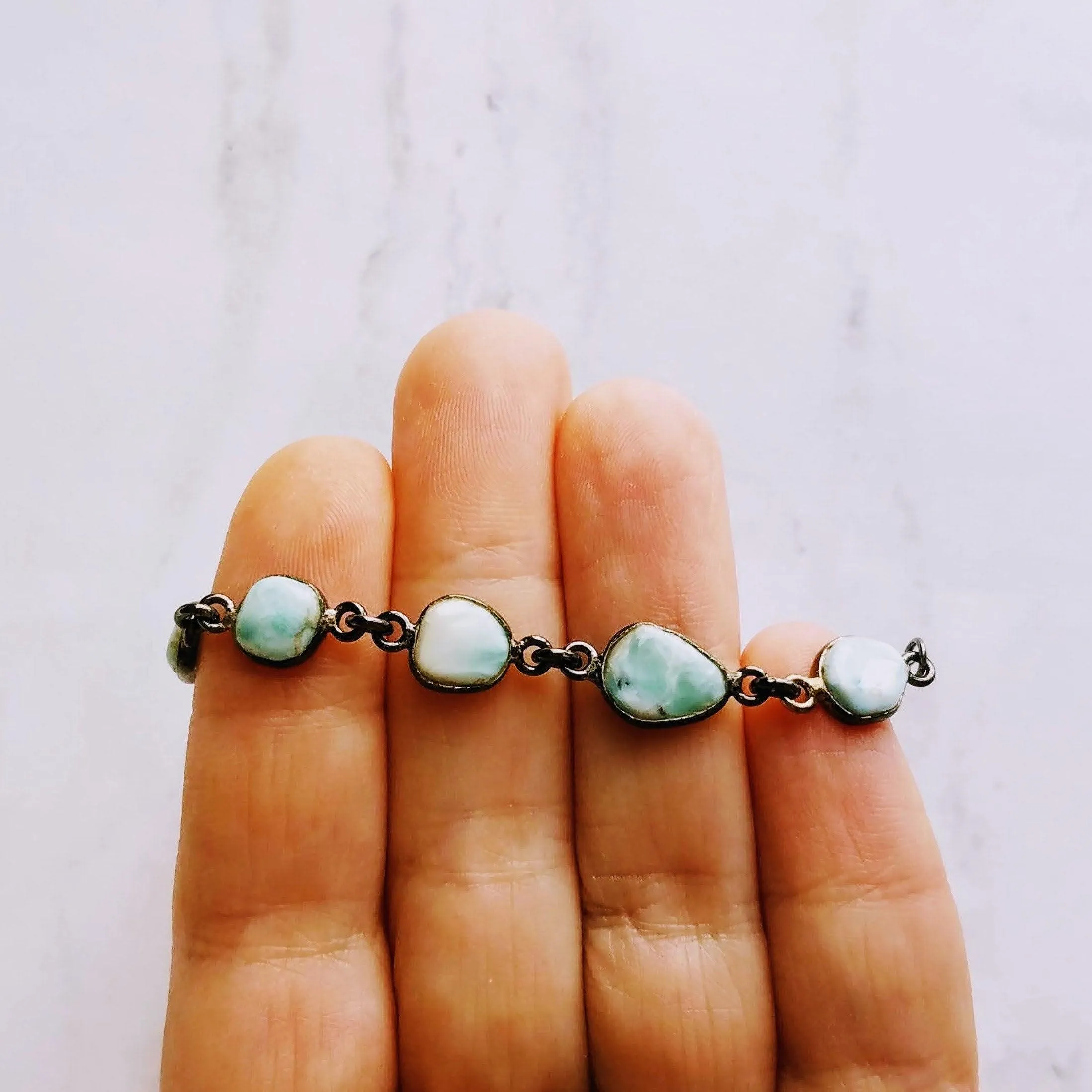 Blue Larimar Bracelet - shiny black gunmetal bezel frames, small organically shaped oval gemstones, aqua genuine stone adjustable chain