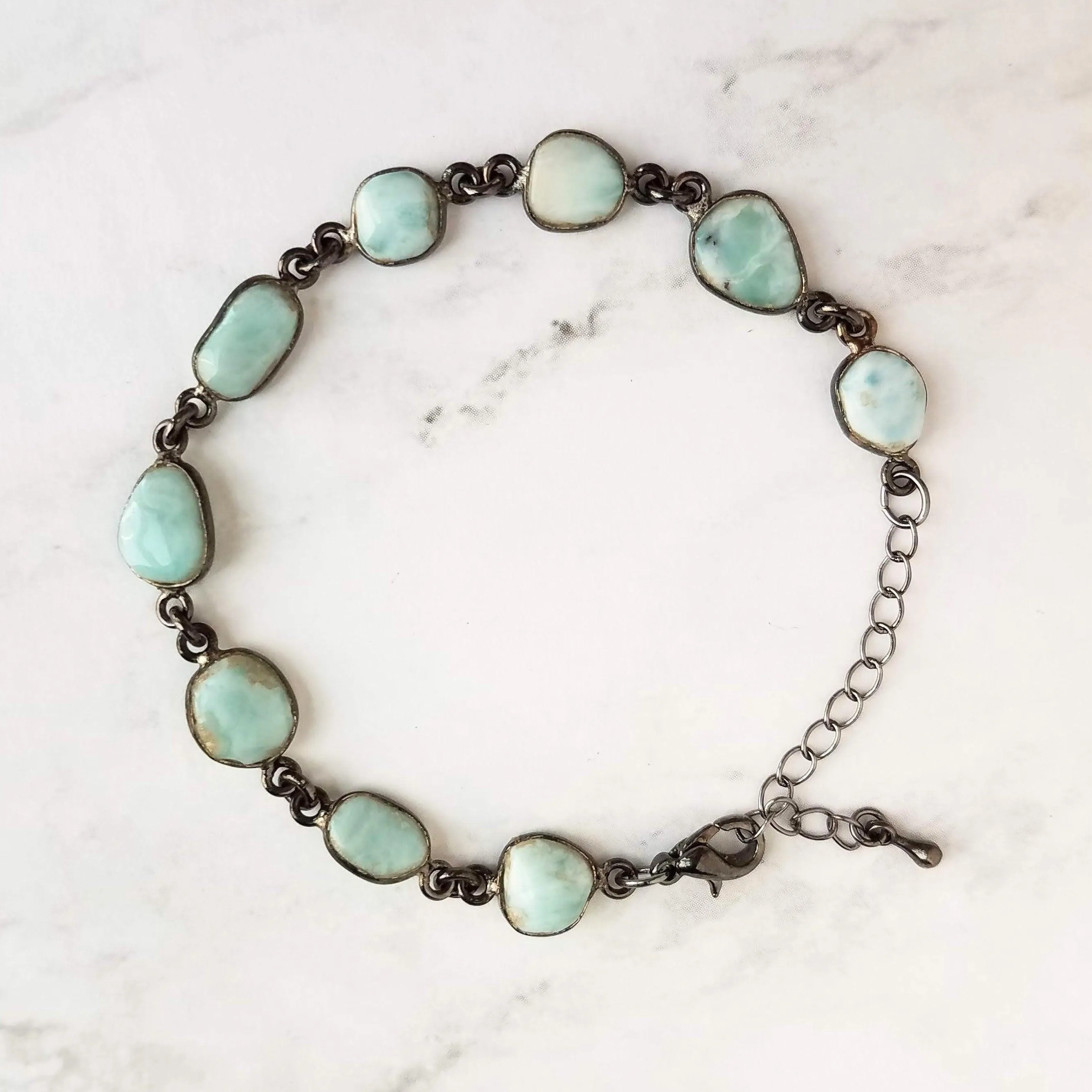 Blue Larimar Bracelet - shiny black gunmetal bezel frames, small organically shaped oval gemstones, aqua genuine stone adjustable chain