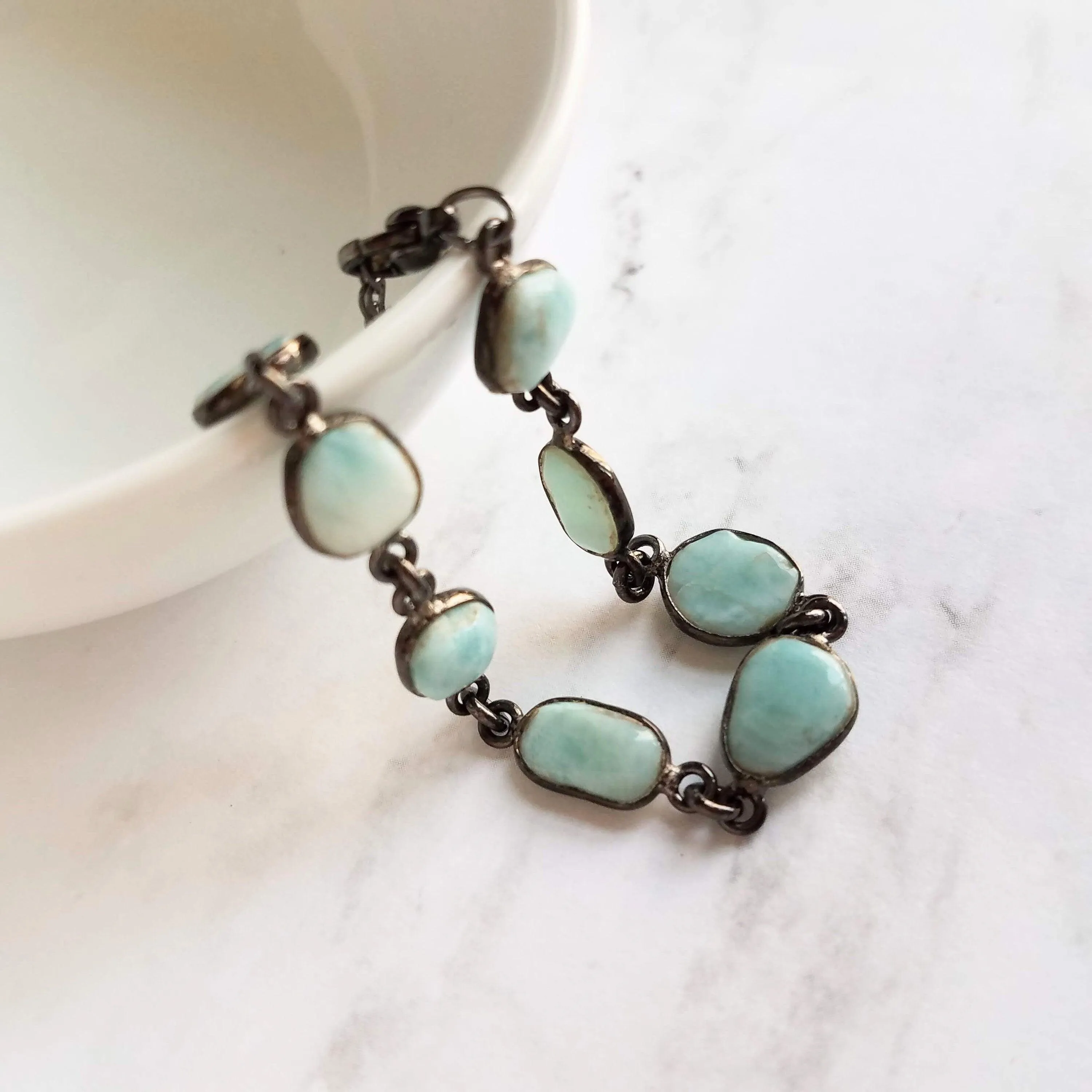Blue Larimar Bracelet - shiny black gunmetal bezel frames, small organically shaped oval gemstones, aqua genuine stone adjustable chain