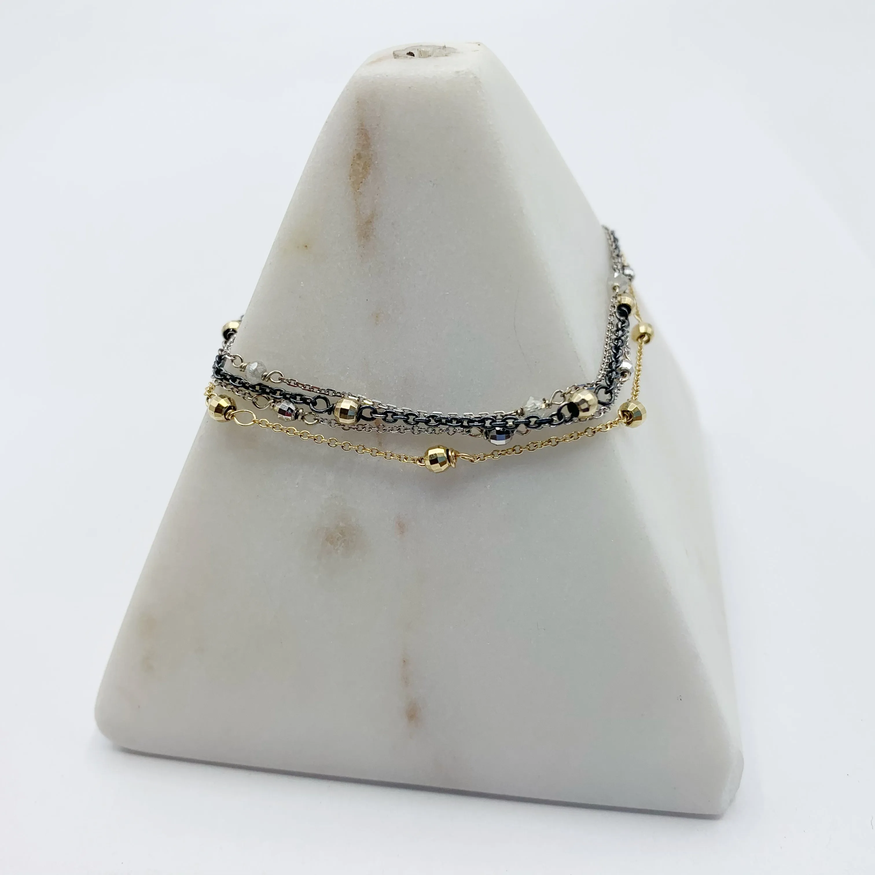 Delicate White Gold Beads Linked in a Golden Chain