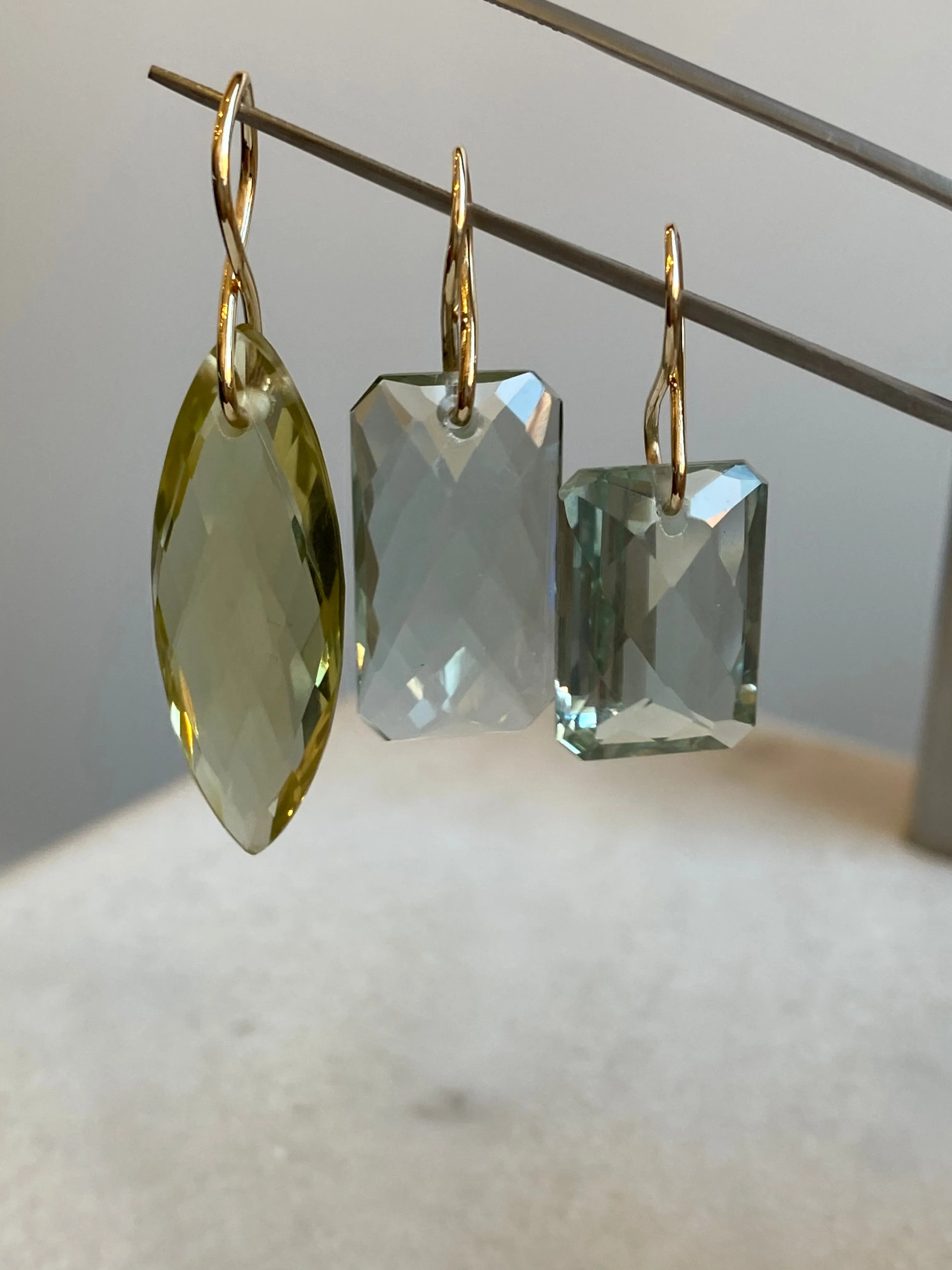 Faceted Marquise Citrine on a 14k yellow gold infinity bale
