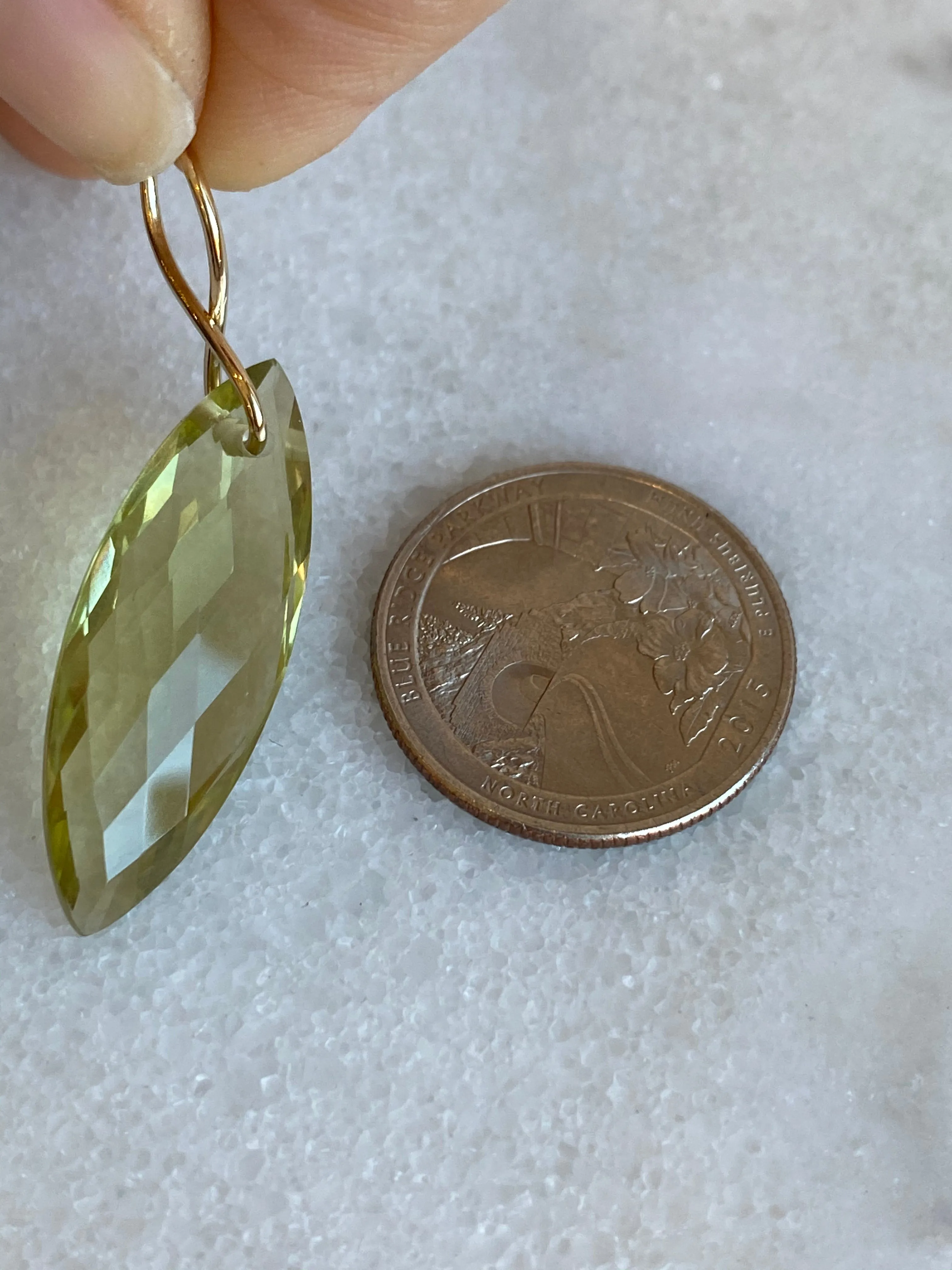 Faceted Marquise Citrine on a 14k yellow gold infinity bale