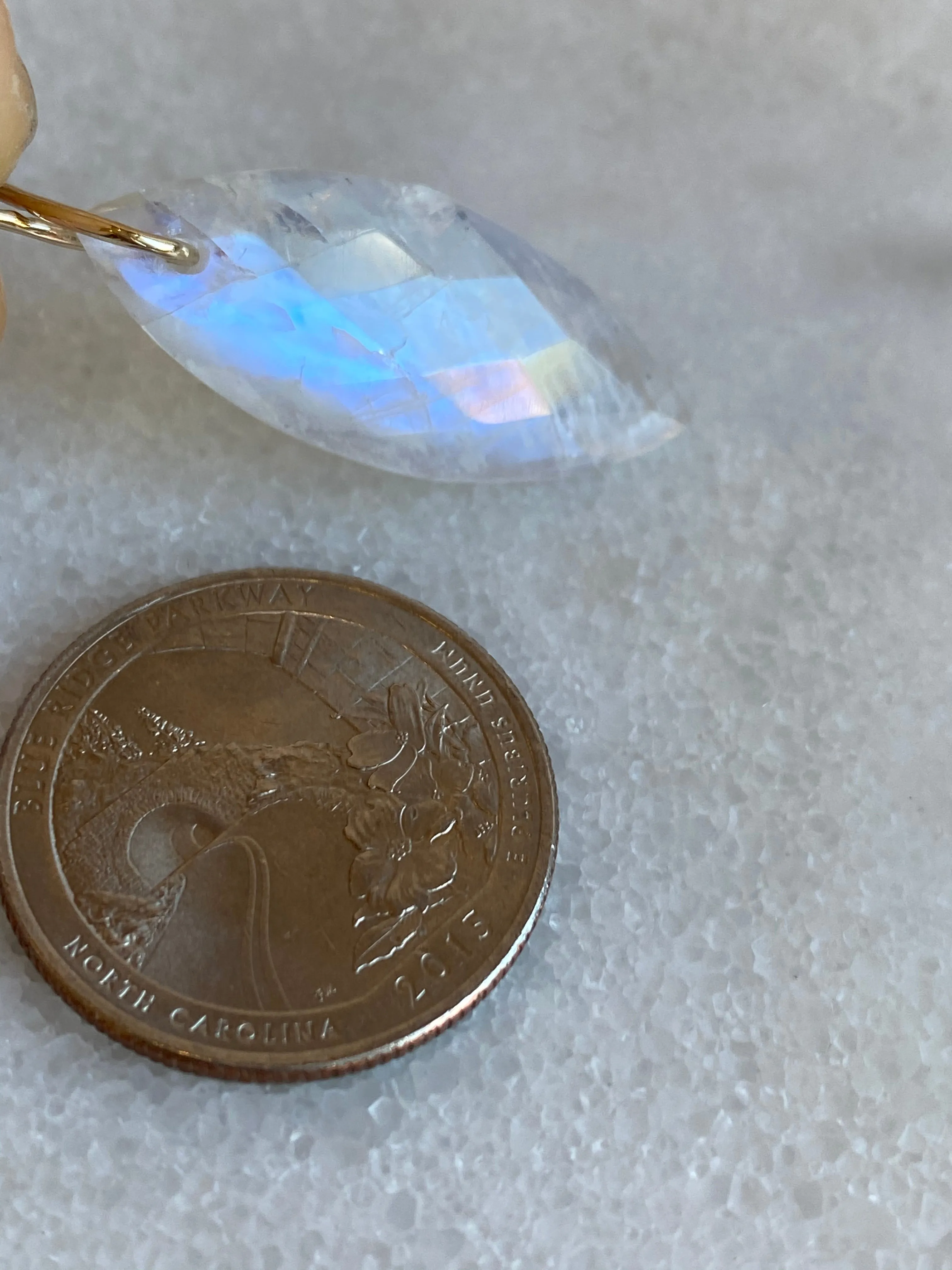 Faceted Marquise Moonstone on a 14k Yellow Gold Infinity Bale