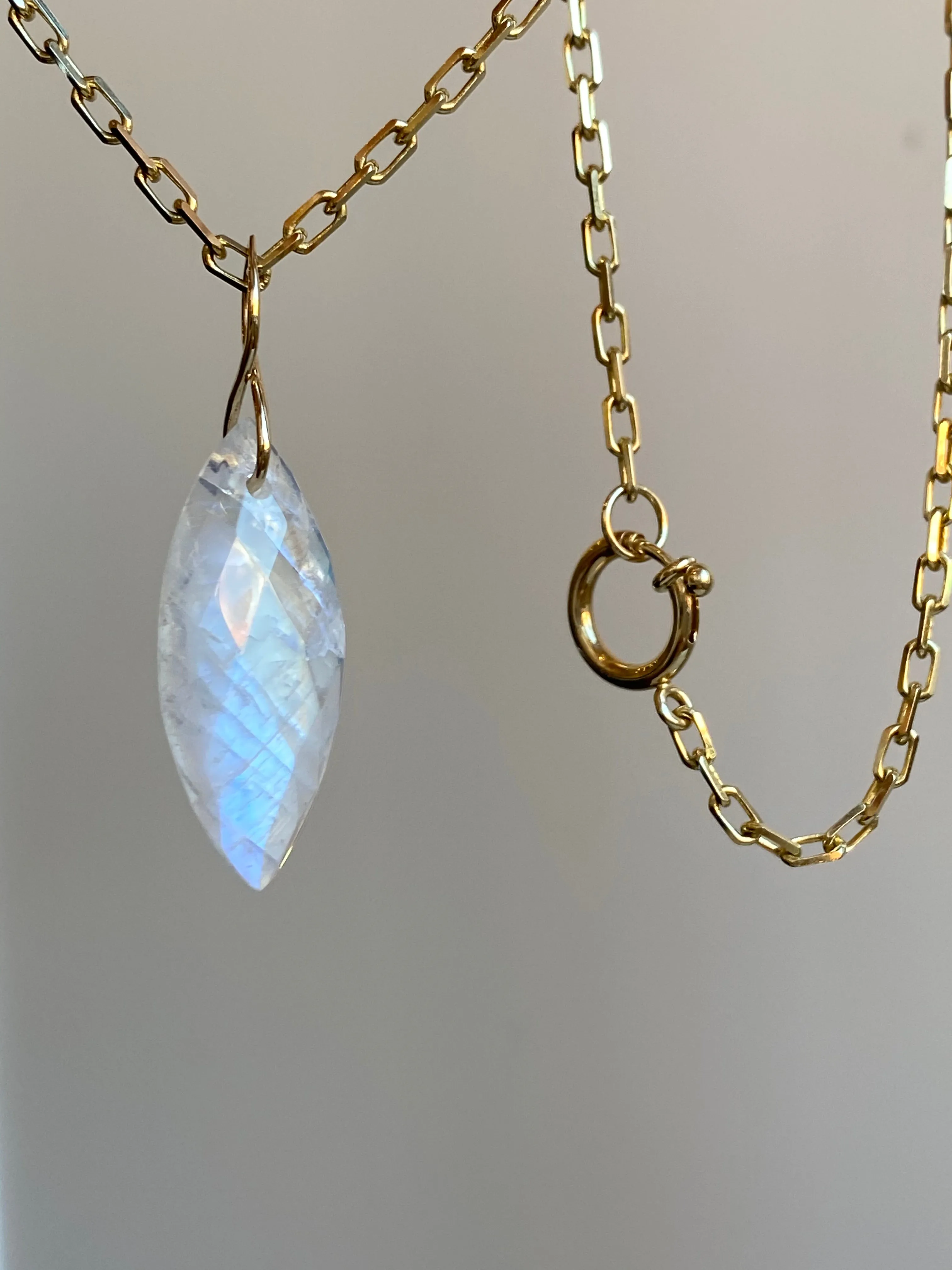 Faceted Marquise Moonstone on a 14k Yellow Gold Infinity Bale