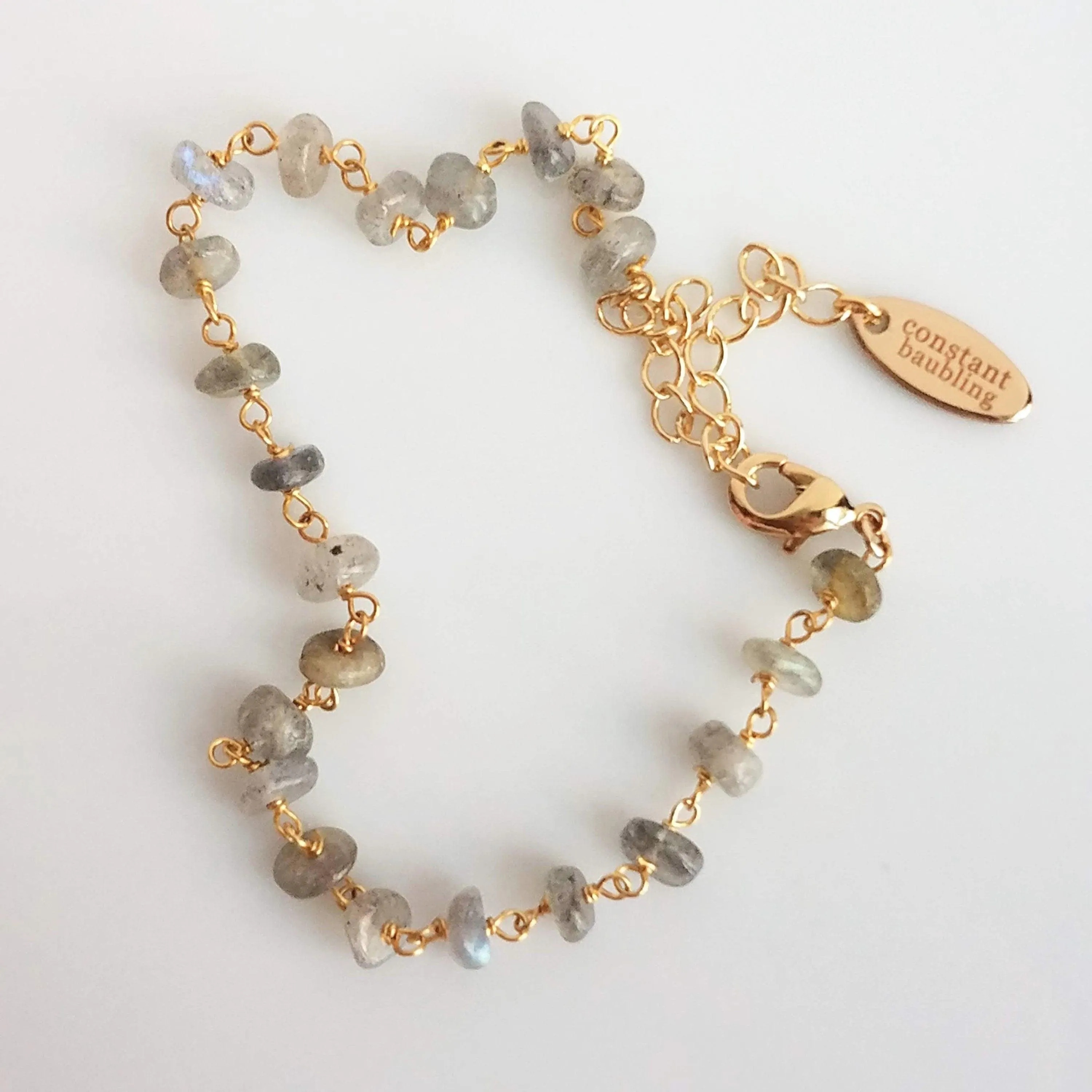Labradorite Bracelet, tiny grey stone, semi precious gemstone, adjustable gold chain, vitreous iridescent blue green flash, spiritual symbol