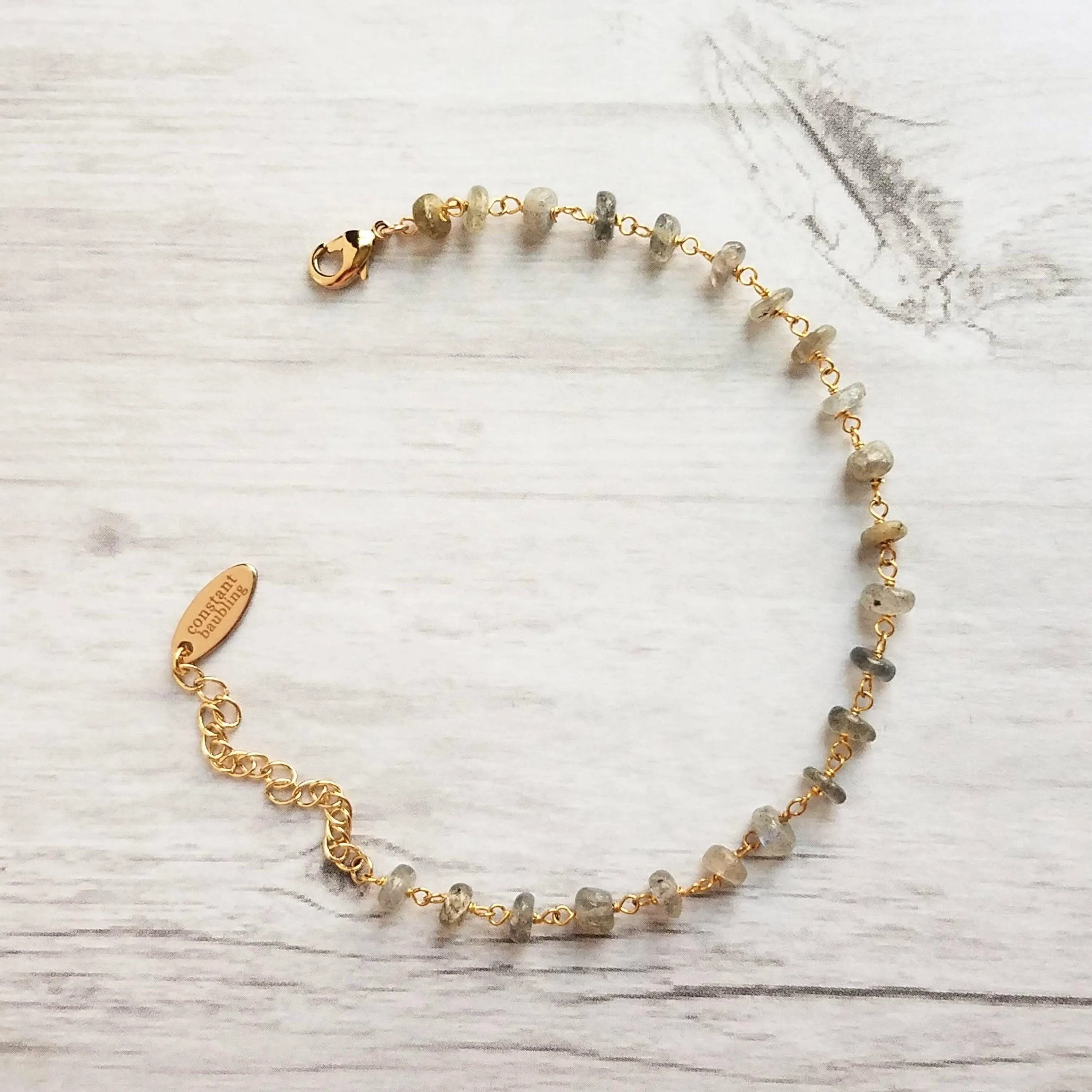 Labradorite Bracelet, tiny grey stone, semi precious gemstone, adjustable gold chain, vitreous iridescent blue green flash, spiritual symbol
