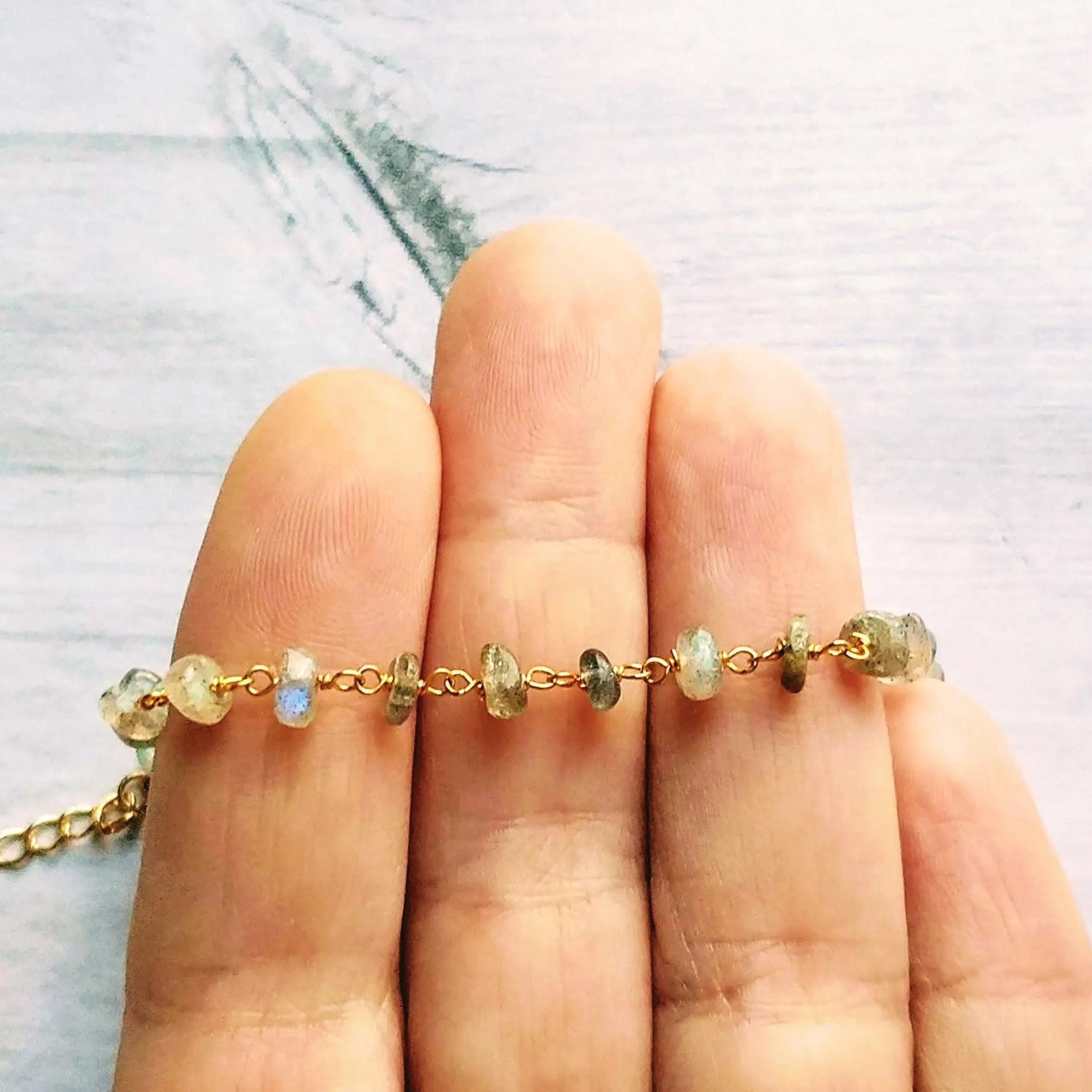 Labradorite Bracelet, tiny grey stone, semi precious gemstone, adjustable gold chain, vitreous iridescent blue green flash, spiritual symbol
