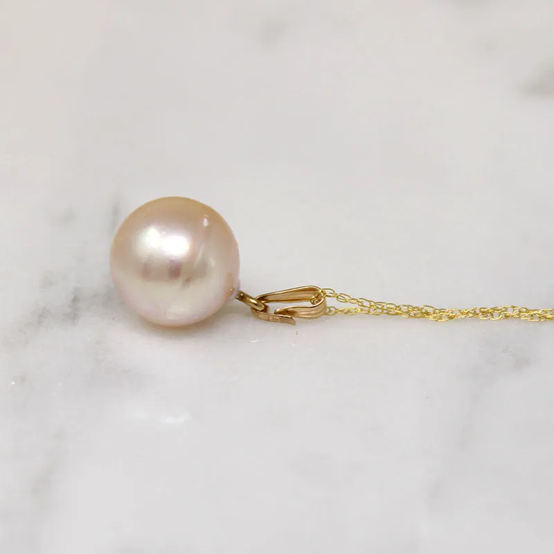 Pearl Solitaire Pendant with Soft Pink Glow