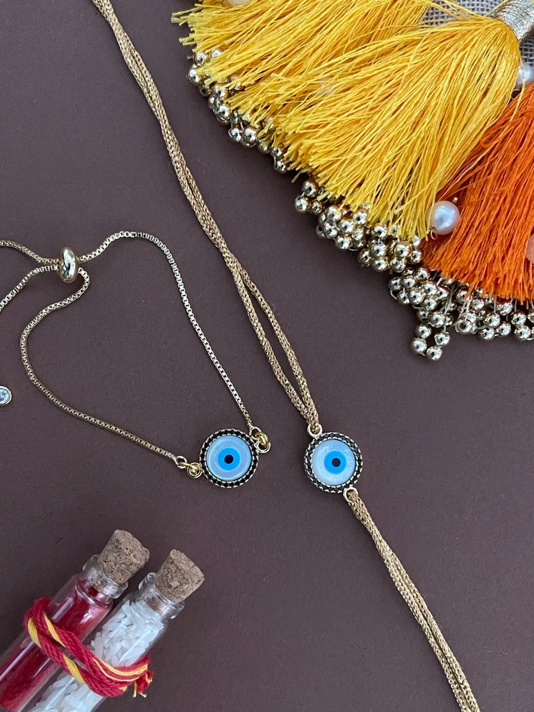 (Rakhi Set of 2) Fancy American Diamond Evil Eye Bracelet And Rakhi Thread For Bhabhi-Brother