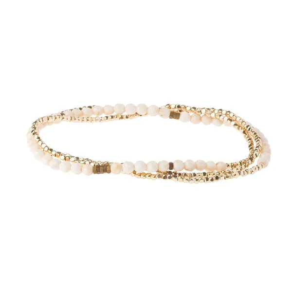 Scout Delicate Stone White Fossil - Stone of Nurturing