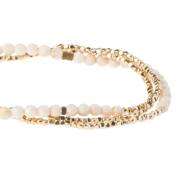 Scout Delicate Stone White Fossil - Stone of Nurturing