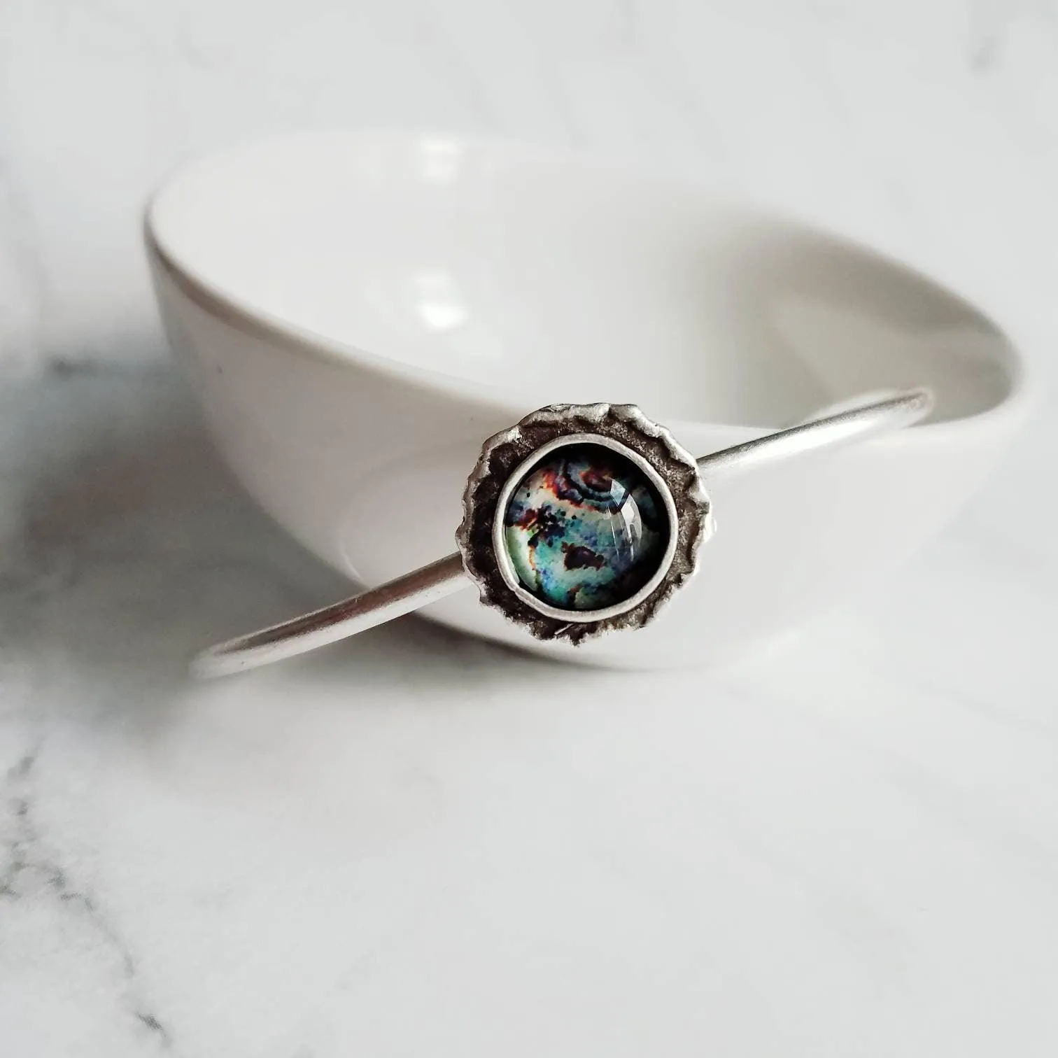 Silver Cuff Bracelet - oval open bangle w/ antiqued oxidized finish - thick simple wire w/ glass swirl ocean waves art in round deep bezel