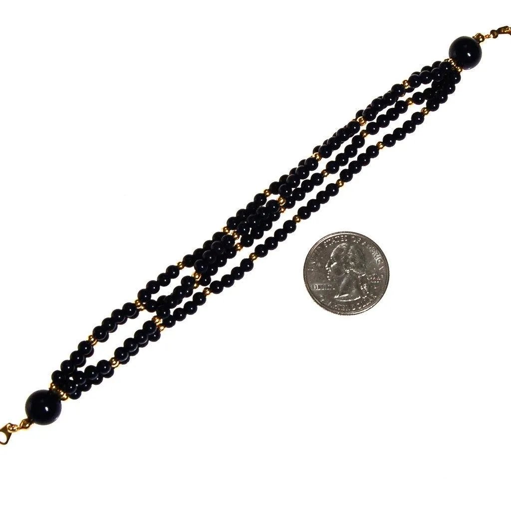 Triple Strand Blue and Gold Bead Bracelet