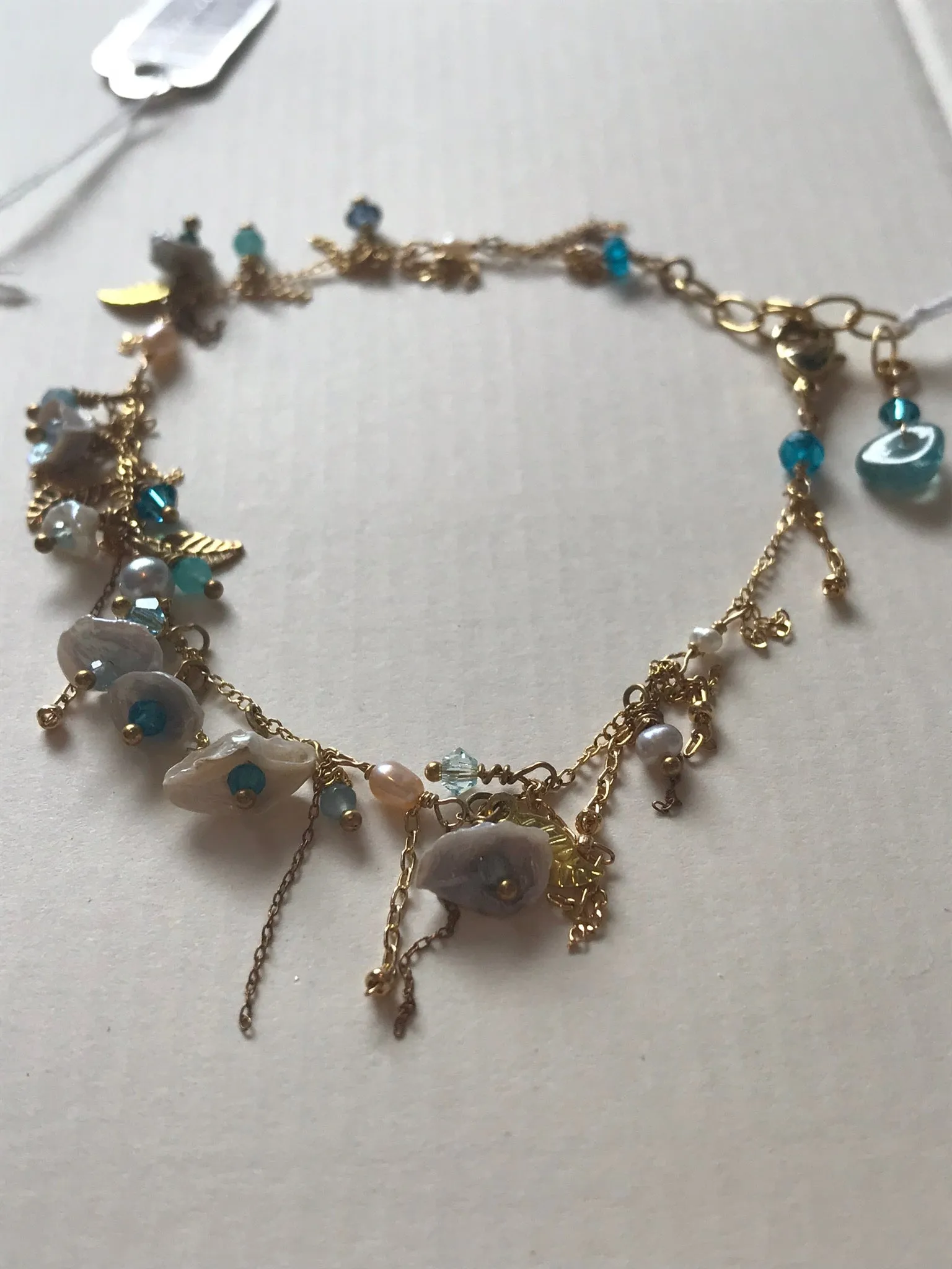 Whimsical Pearl Charms Bracelet with Multi Crystals