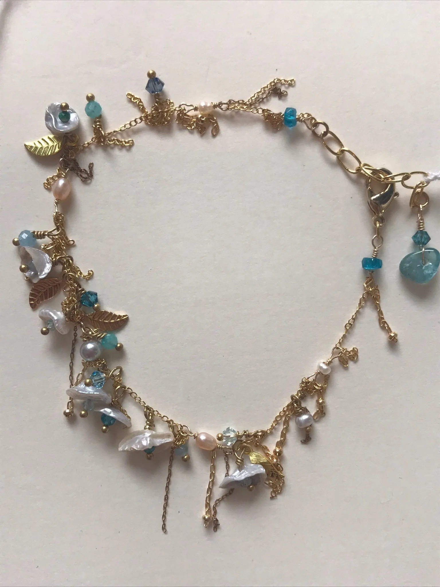 Whimsical Pearl Charms Bracelet with Multi Crystals