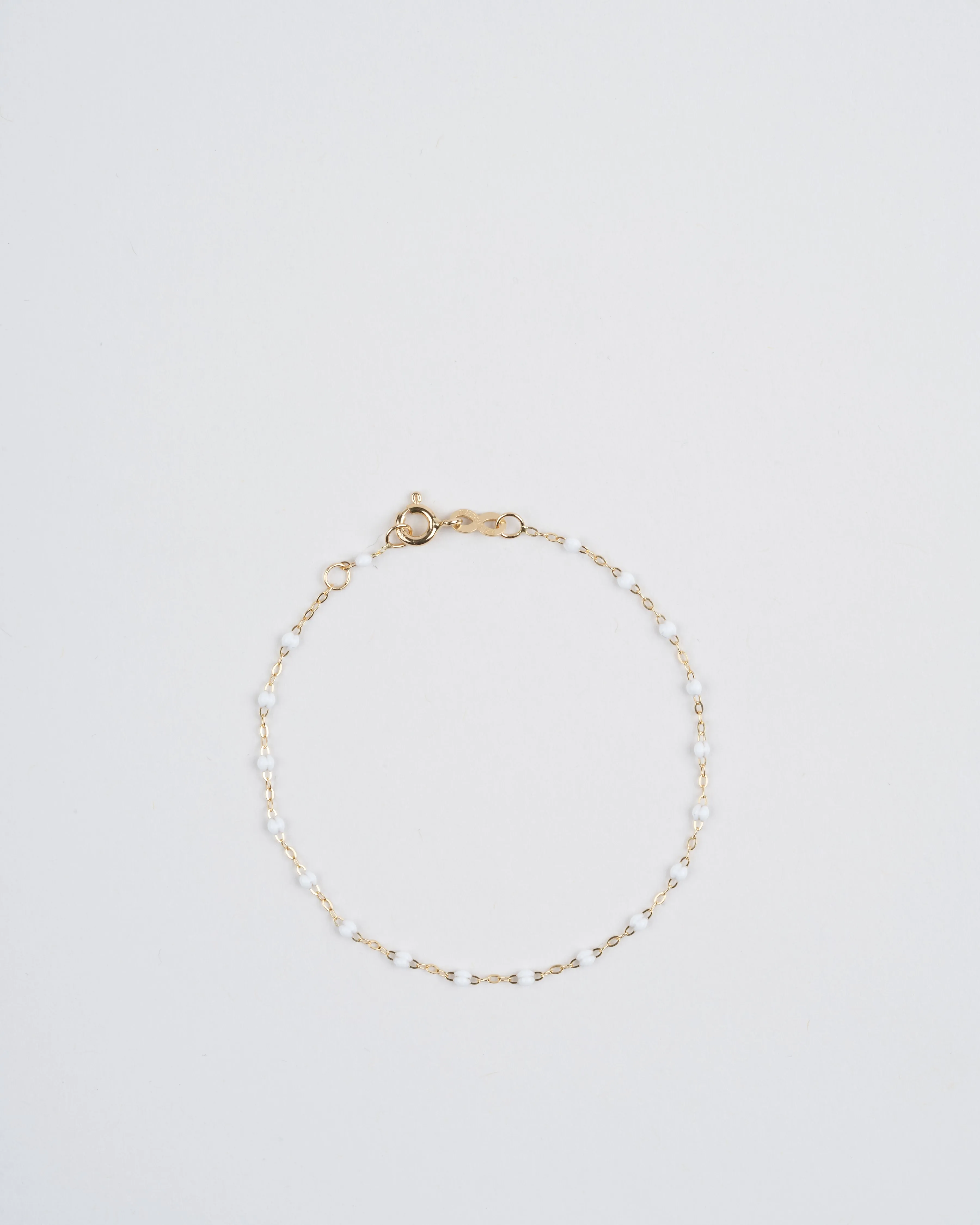 white bead bracelet  - yellow gold